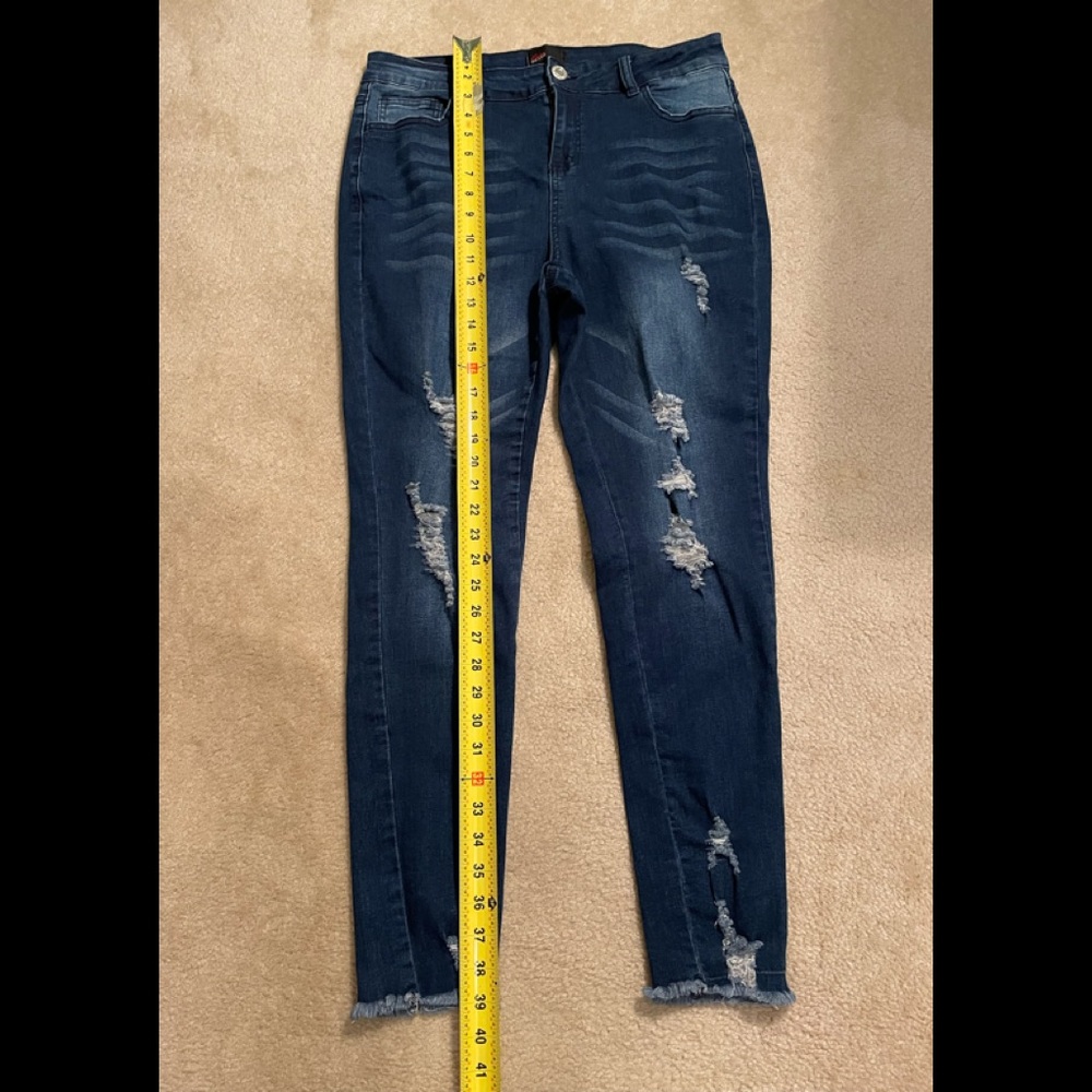 Enjoy Jeans distressed with distressed edges at bottom.  Size 14